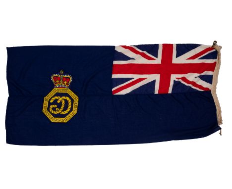 An HM Coast Guard Ensign: 80 x 184cm, with manuscript  note 'This ensign was a gift from Her Majesty's Coast Guard for the 'S