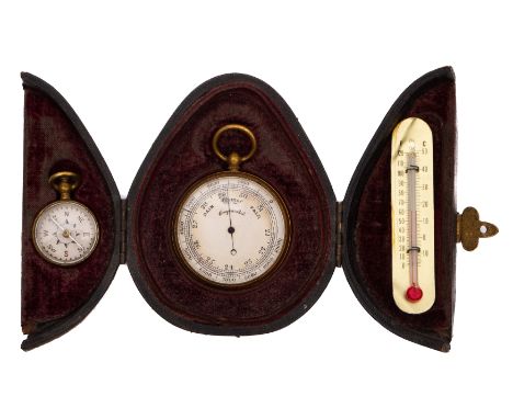 A late 19th century leather cased pocket barometer and compass set: the 1 1/12 inch dial barometer with silvered dial and knu
