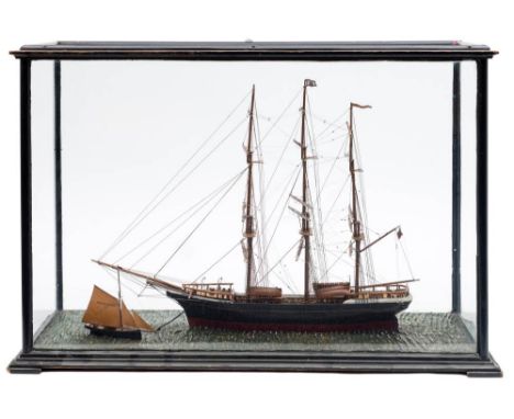 A late 19th/early 20th century cased scale waterline model of the clipper Pretty Polly: standing and running rigged with Red 