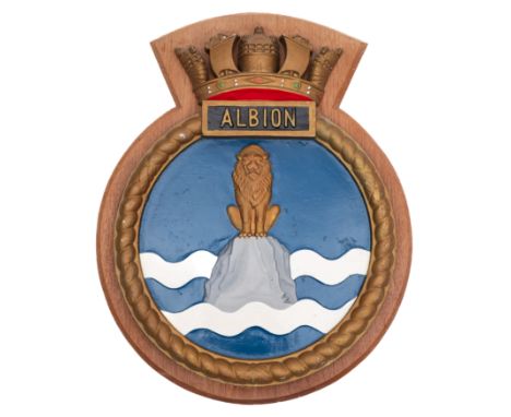 The ship's badge from the Royal Navy Centaur-class light carrier HMS Albion (R07): mounted on an oak plinth, 51 x 41cm.*Notes