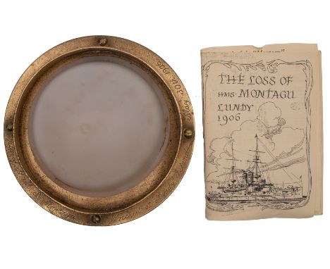 A circular brass bulkhead light from the Royal Navy Duncan-class battleship HMS 'Montagu': inscribed to bezel 'Relic of HMS M