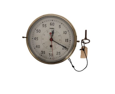 A Smith 'Astral' brass bulkhead clock:  white enamel dial signed as per title with Arabic minutes and subsidiary hours dials,