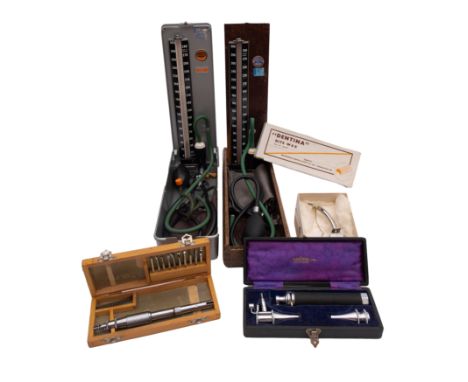 A small group of mid 20th centred medical instruments: comprising a tracheotomy tool by Pelnlon, an Auroscope in case, a dent