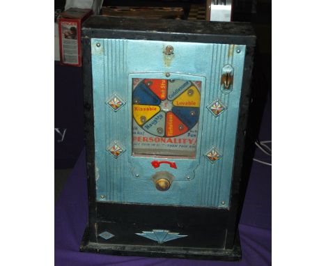 A vintage Personality coin operated machine, in wooden case, 61 x 39cm Condition Report: Available upon request