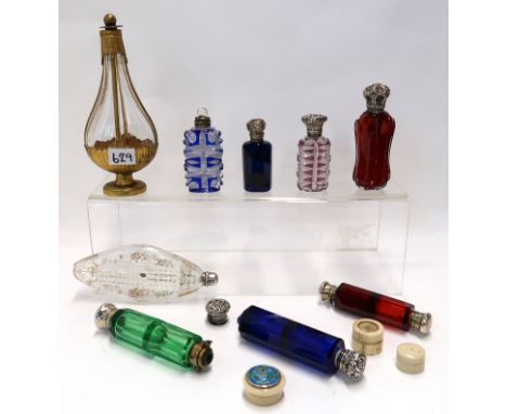 A collection of double end scent bottles and other scent and smelling salt bottles, including a vintage Christian Dior and an