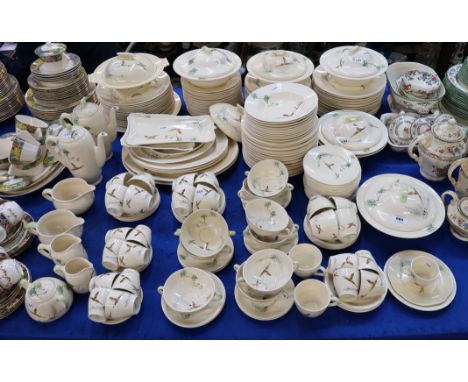 An extensive collection of Royal Doulton The Coppice tablewares including plates, bowls, tureens and covers, soup coupes, cup