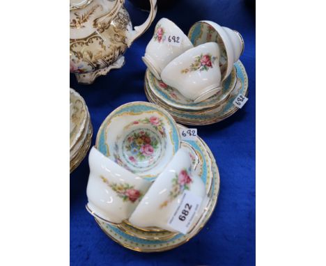 Foley China Windsor pattern teawares Condition Report:6 cups - none ping and all are tea stained. 6 saucers - 1 cracked and 1
