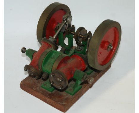 Four various vintage model engines, 20cm wide and smaller Condition Report: Available upon request