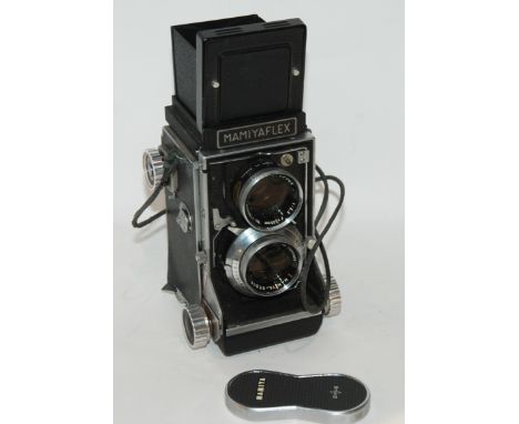 A Mamiyaflex camera and light meter Condition Report: Available upon request
