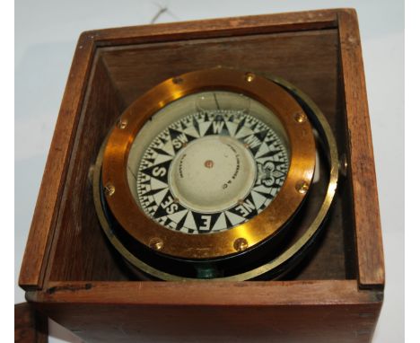 A cased compass by Joseph Lawerence &amp; Co, Glasgow Condition Report: Available upon request
