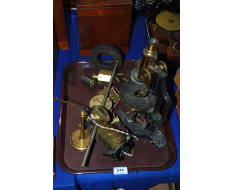 A brass microscope (def), various weights etc Condition Report: Available upon request