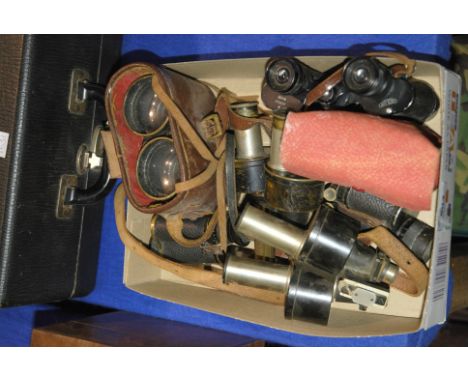 A small collection of binoculars, microscope lenses etc Condition Report: Available upon request