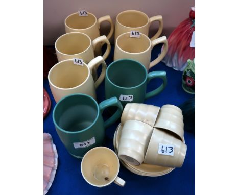 Five Keith Murray for Wedgwood Matt Straw glaze tankards, two green examples and five cups and six saucers in Matt Straw glaz