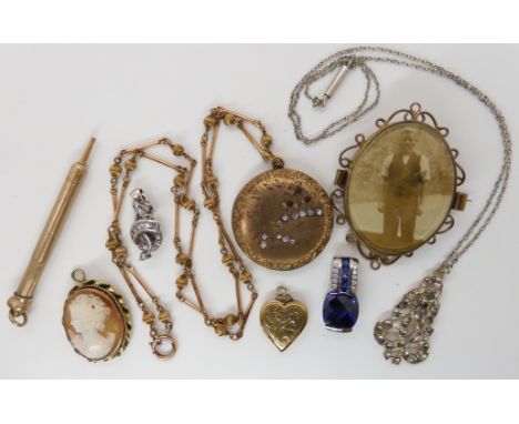 Gold plated items to include lockets a propelling pencil, cameo and other items Condition Report: Not available for this lot