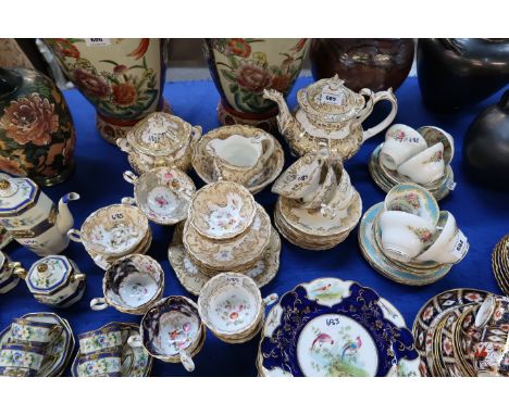 A Victorian puce and flower decorated teaset and other similar pieces Condition Report: Teapot, slop bowl - cracked and repai