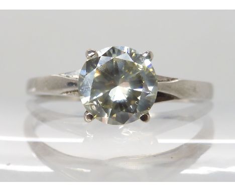 An 18ct white gold diamond solitaire ring, set with an estimated approx 1.10ct brilliant cut diamond, finger size R, weight 3