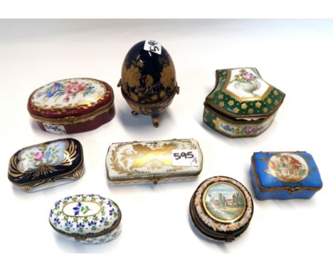 Seven porcelain trinket boxes and a glass example Condition Report: Available upon request