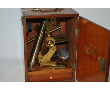 A brass microscope by J.H. Steward, London in fitted case Condition Report: Available upon request