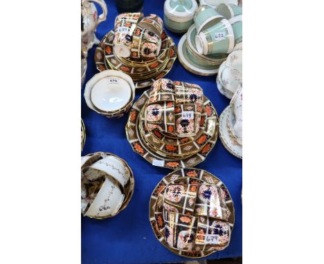 A Royal Crown Derby teaset comprising two cake plates, twelve cups, saucers and plates, sugar bowl and a jam dish Condition R