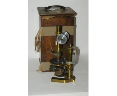 A brass microscope in case (def) Condition Report: Available upon request