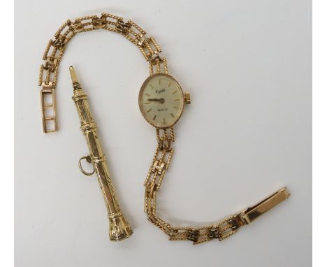A 9ct gold ladies Everite wristwatch, and a yellow metal propelling pencil, weight combined 11.3gms Condition Report: Availab