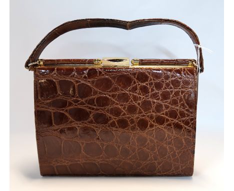 A vintage crocodile skin handbag Condition Report: Available upon request