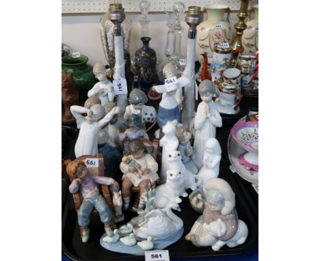 A collection of Nao and Lladro figures of children and animals, two white glazed Doulton figures etc Condition Report: Girl i