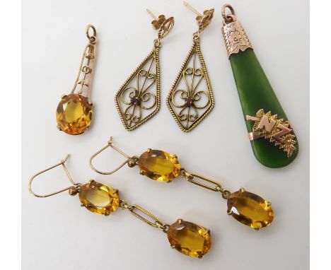 A pair of 9ct gold yellow gem set earrings, a similar pendant, 9ct ruby set earrings and a New Zealand jade pendant weight to