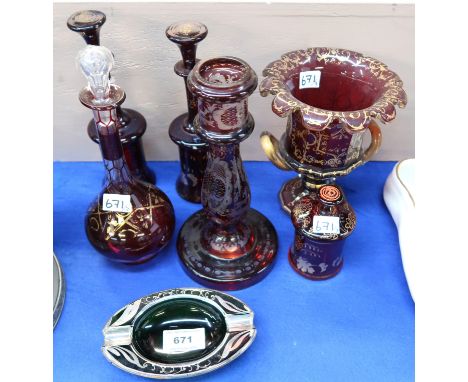 A collection of ruby flashed glass ware with gilded decoration and a green glass ashtray with silvered decoration Condition R