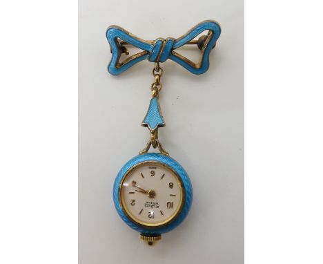 A silver gilt and turquoise enamel fob watch, retailed by Birks weight without mechanism 9.5gms Condition Report: Available u