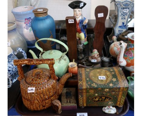 A Prestonpans pottery teapot with moulded bamboo decoration, an enamel teapot, two wooden plate stands, an Art Deco ladies he