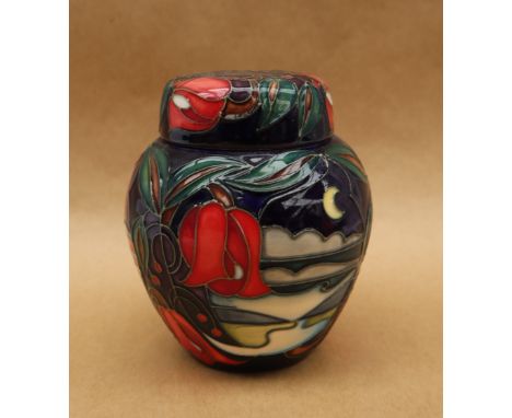 A Moorcroft pottery ginger jar and cover, with tube lined decoration of three panels depicting the same scene at mid day, sun