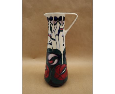 A Moorcroft pottery slender jug decorated in the Charles Rennie Macintosh pattern, dated 95, impressed and painted marks, 24c