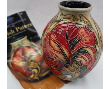 A Moorcroft pottery Spanish Pattern vase, with tubelined floral decoration impressed and painted marks dated 2013, 14cm high 