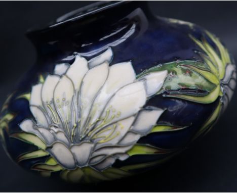 A Moorcroft pottery vase decorated in the Queen of the Night pattern by Anji Davenport, for the collectors club, dated 2001, 