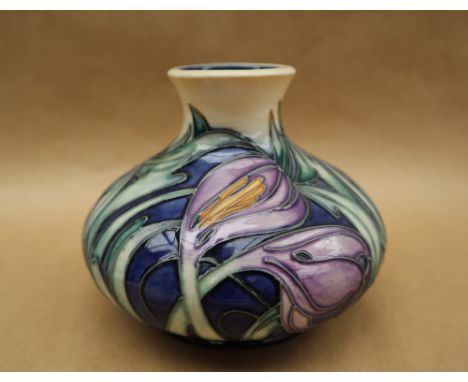 A limited edition Moorcroft pottery vase decorated in the "Saffron Crocus" pattern, signed Emma Bossons, dated 2003, No.5/150