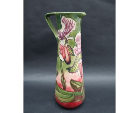 A Moorcroft pottery limited edition slender jug decorated in the Himalayan Orchid pattern, by Philip Gibson, dated 2001, No.2