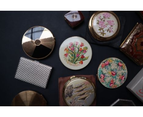 A Yardley gilt metal powder compact together with a Stratton white metal compact, an enamel decorated powder compact for the 