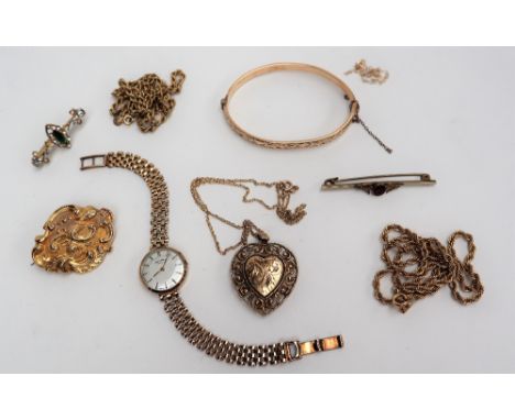 A lady's 9ct gold Rotary wristwatch, the circular dial with batons on a 9ct gold bracelet strap and 9ct gold necklaces, overa