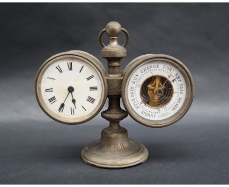 A late 19th century desk clock and barometer, in white metal with a suspension loop and spreading base, 14cm high  CONDITION 