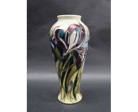 A Moorcroft pottery limited edition inverted baluster vase decorated with purple irises, by Emma Bossons, dated 2003, No.67/1