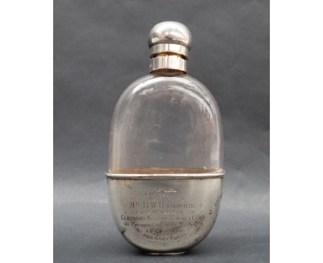 A George V silver and glass hip flask, inscribed "Mr R.W. Radmore, by members of the Cleobury Mortimer Cricket Club in recogn