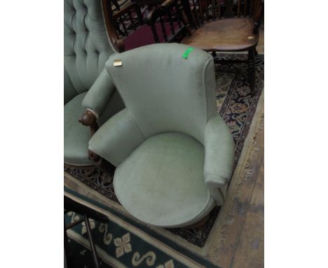 Small upholstered tub chair on light wood legs, Queen Anne style