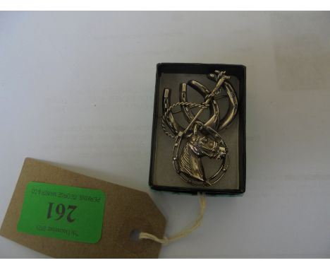 Silver horsey brooches 
