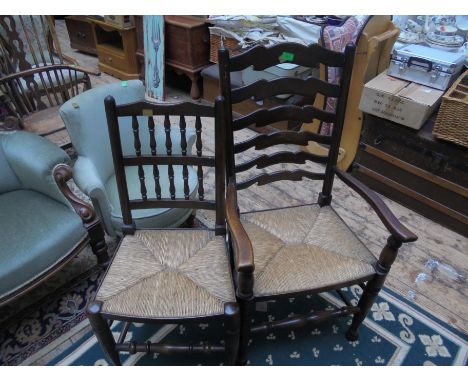 Pair of oak ladder backed style chairs with rush seating, 1 with arms