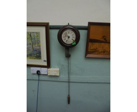 Small circular postman's alarm, wood surround and painted face 