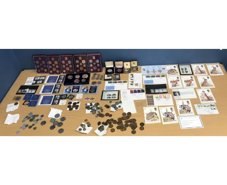 A box of assorted coinage to include various commemorative coins, including Elizabeth II Silver Jubilee coins, a 1951 crown i