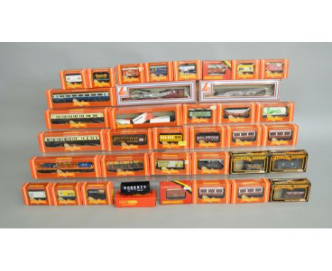 OO Gauge. 36 boxed Rolling Stock, mostly by Hornby, although does include some examples by Lima, Mainline etc. (36)