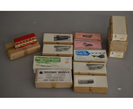 13 boxed OO scale white metal Bus,Coach and Lorry kits by Langley Miniatures, Pirate Models etc.one bus model has&nbsp; been 