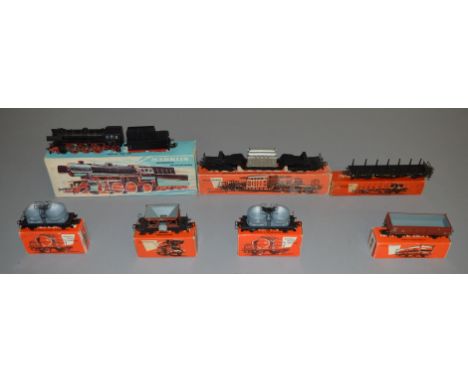 HO Gauge. A boxed Marklin 3005 Locomotive together with 6 boxed items of Rolling Stock, 4516, 4602, 4610, 4617 and 2 x 4622. 
